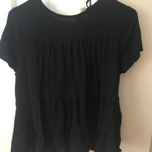 Flouncy and cute black blouse.